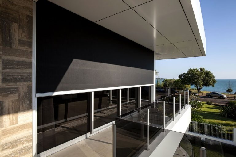 Outside view of classic house with blackout roller blinds