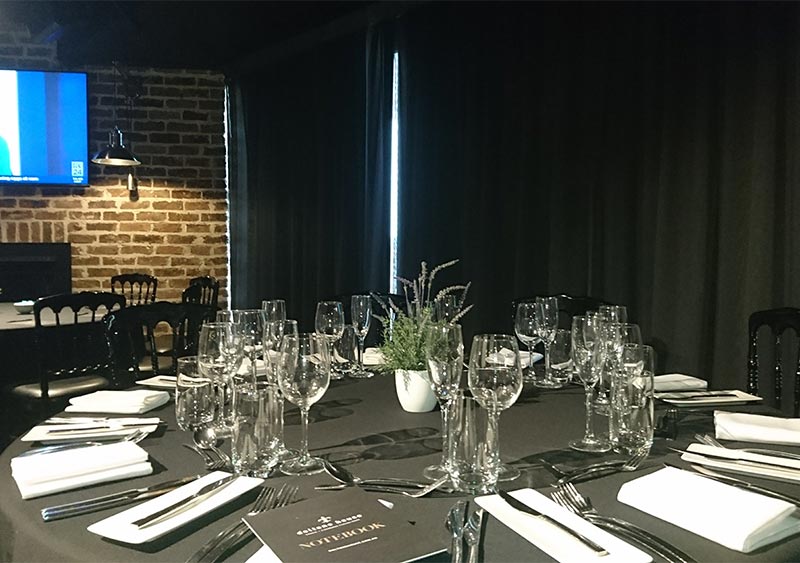 A fine dining restaurant with blackout curtain